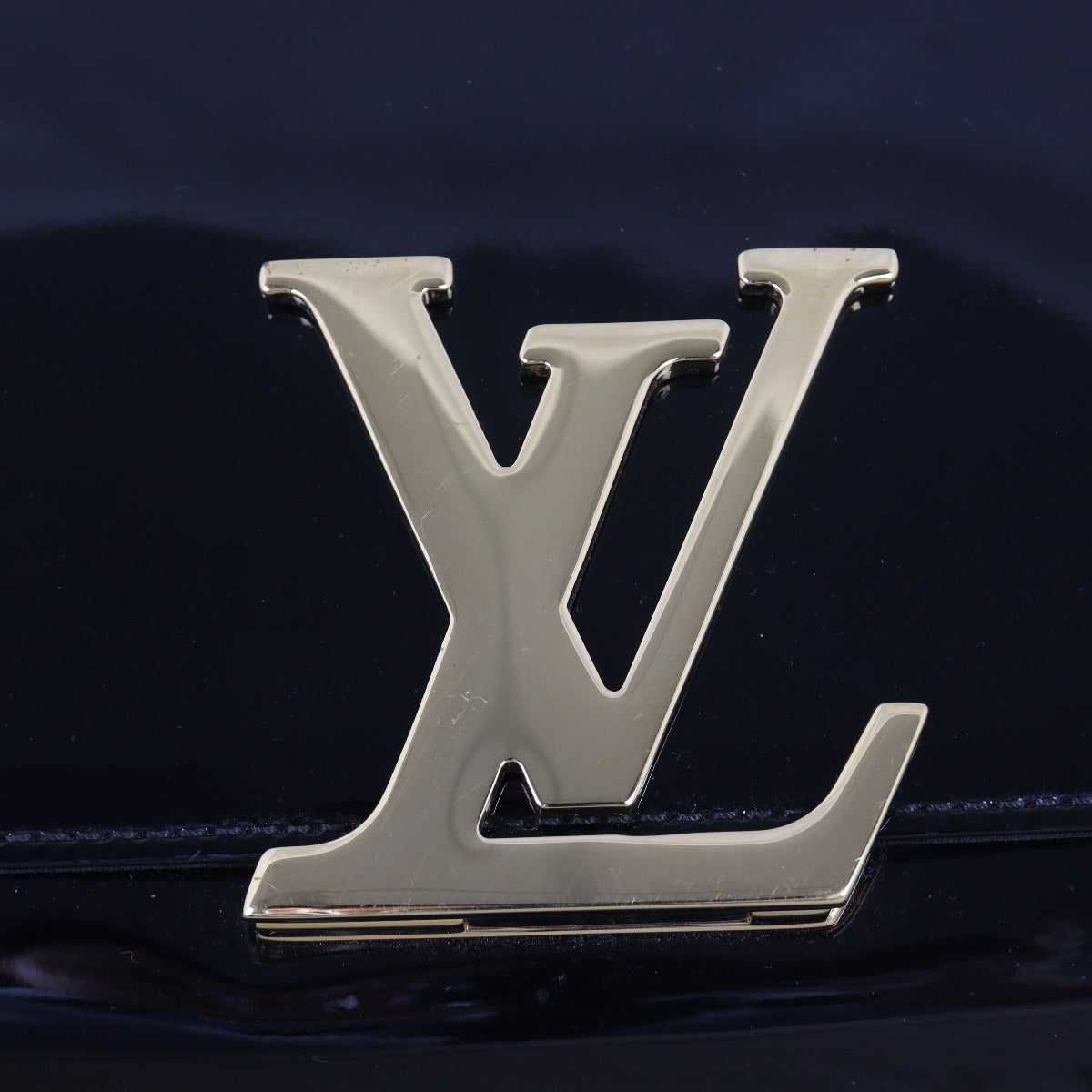 Louis Vuitton Louise Clutch Patent