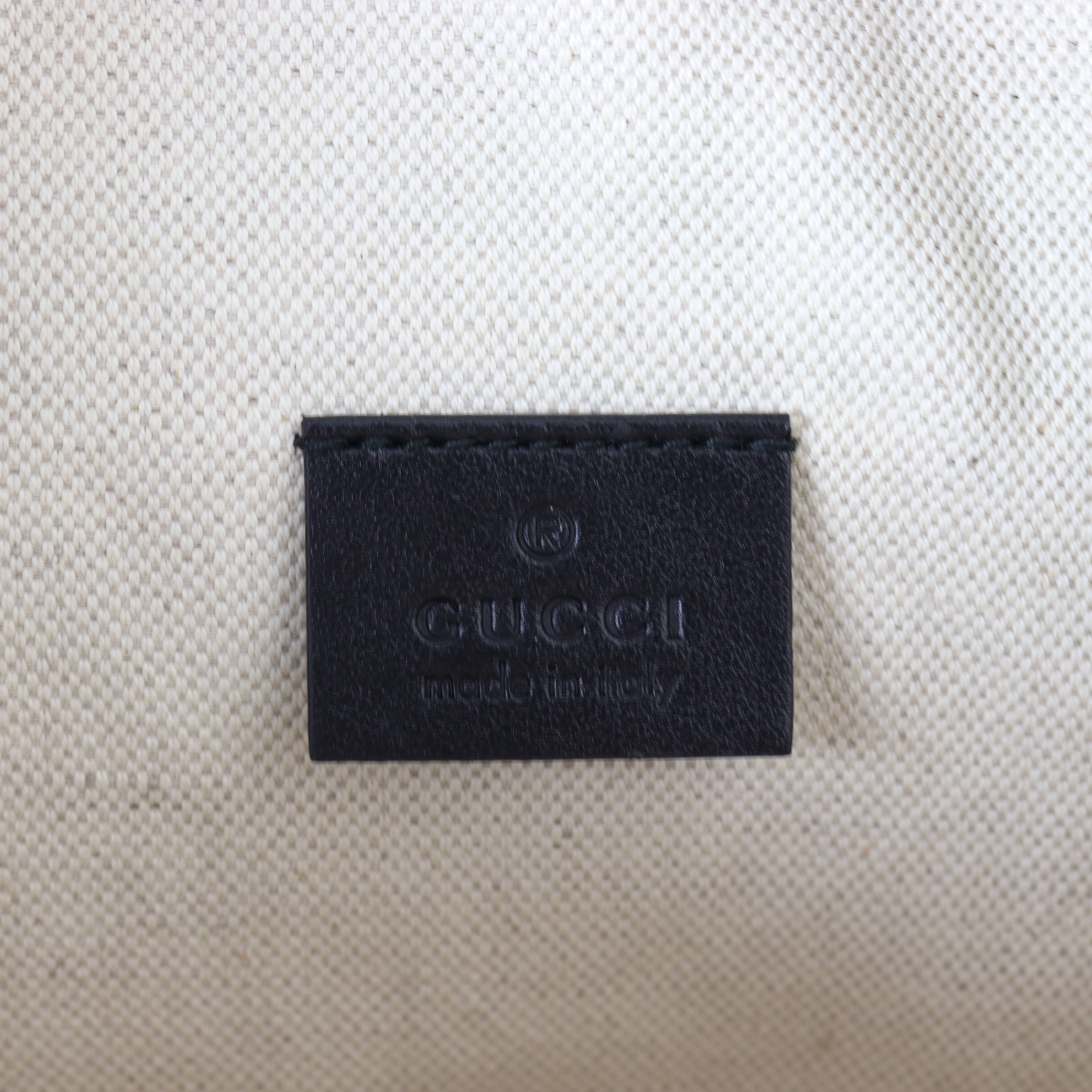 Gucci GG Embossed Leather Belt Bag