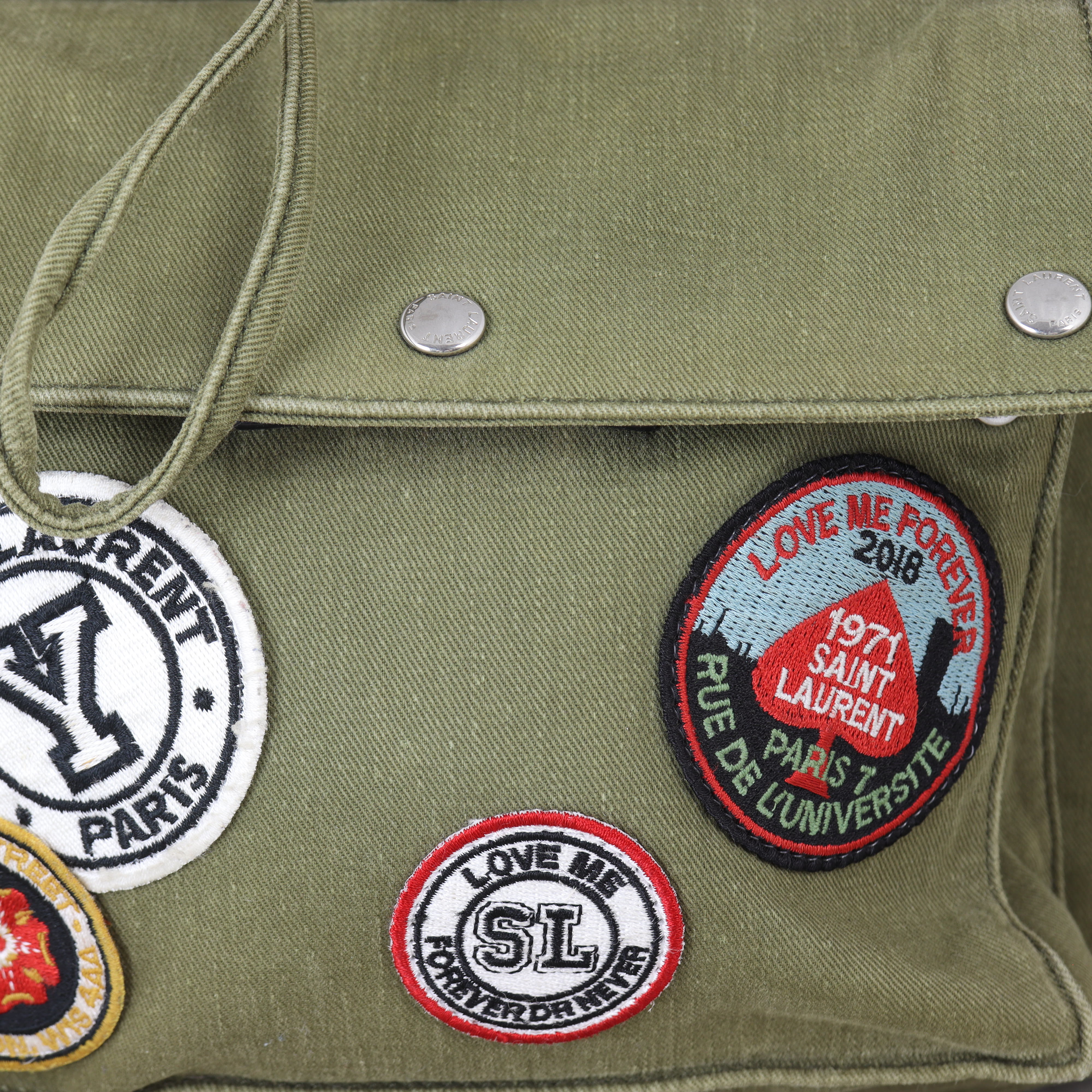 Saint Laurent Noe Canvas Multi Patch Backpack