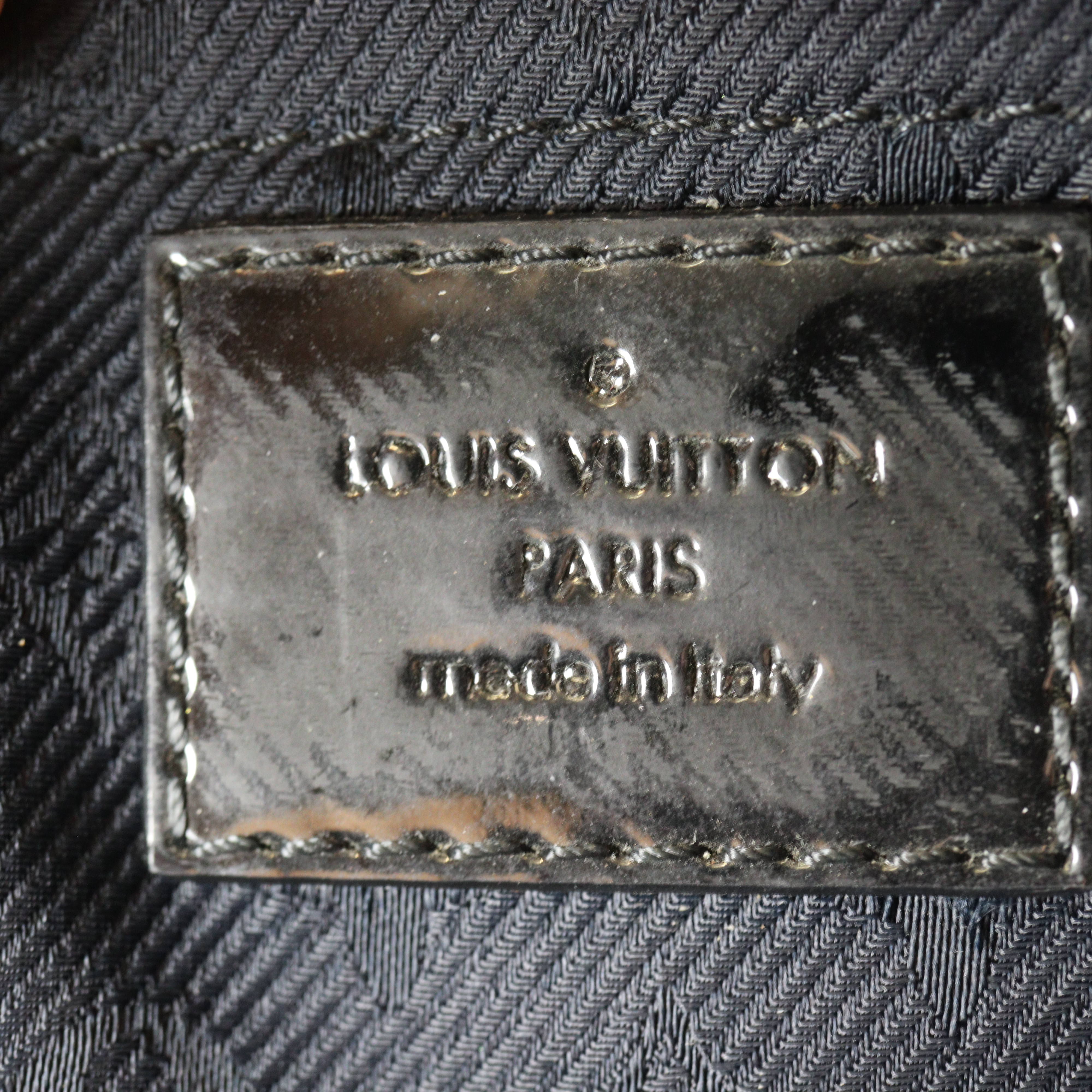 Louis Vuitton Altair Clutch Monogram Motard