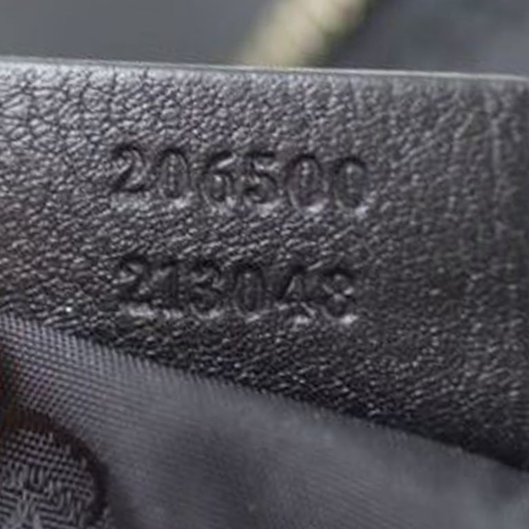 Gucci Guccissima Signature Leather Duffle Date code