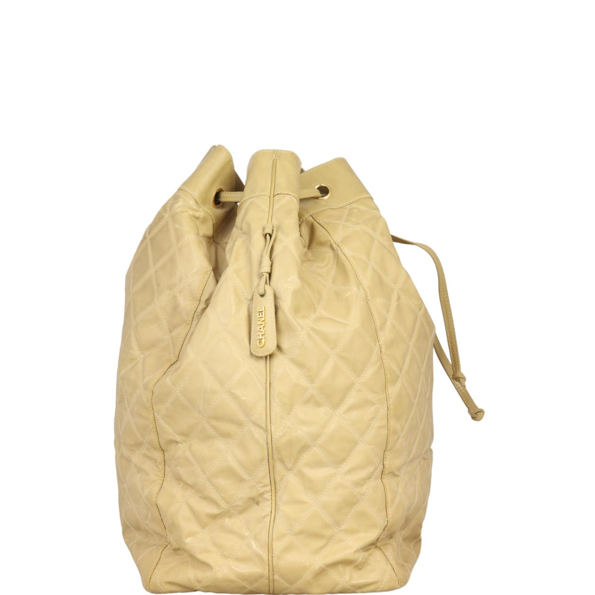 Chanel Quilted CC Drawstring Bucket Bag | Beige
