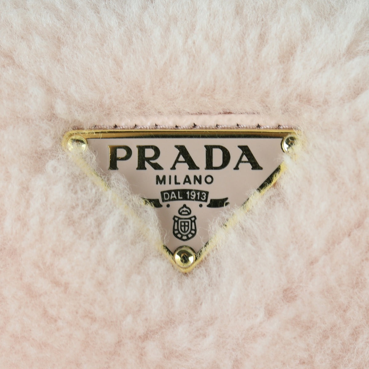 Prada Triangle Saffiano Shearling Mini Bag