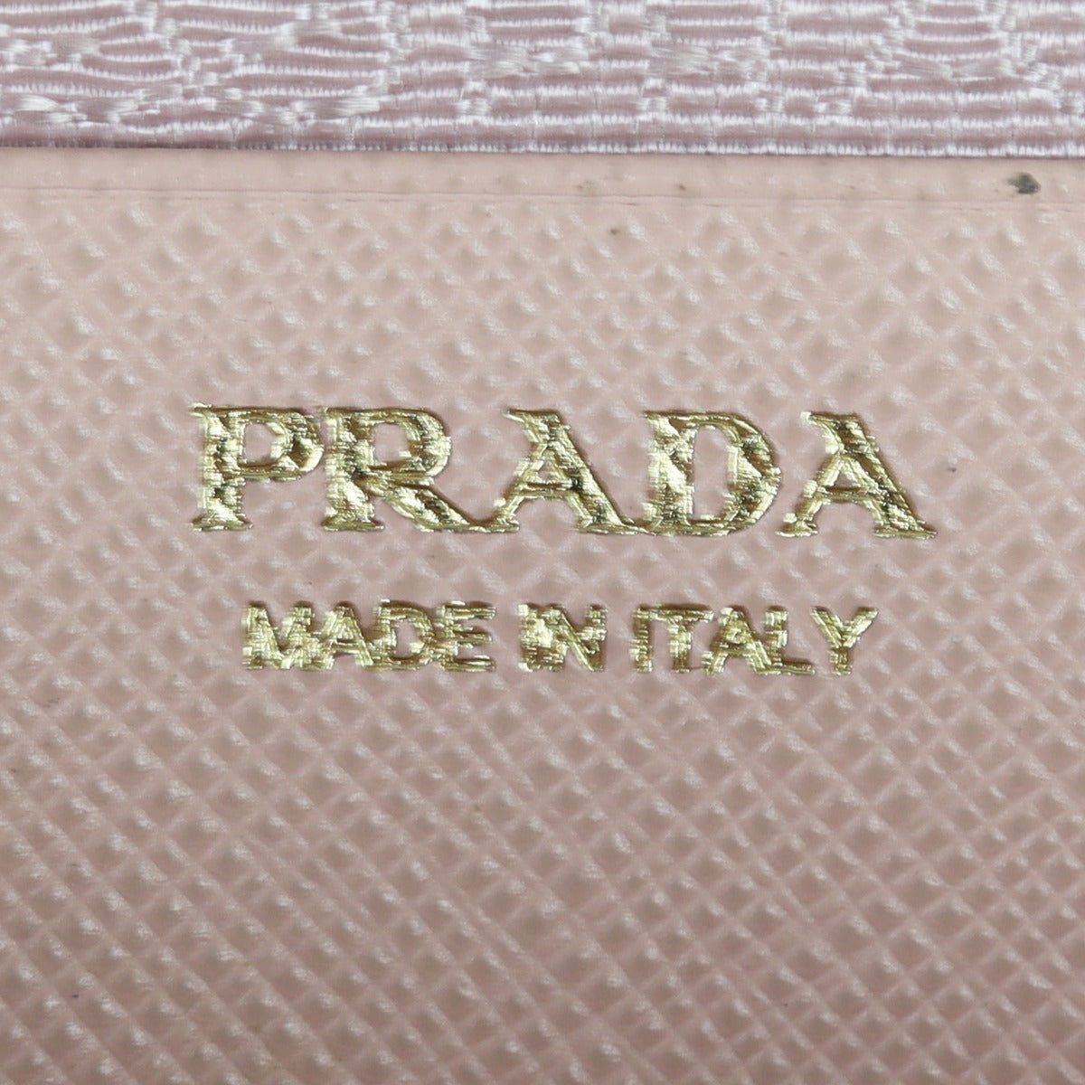 Prada Triangle Saffiano Shearling Mini Bag